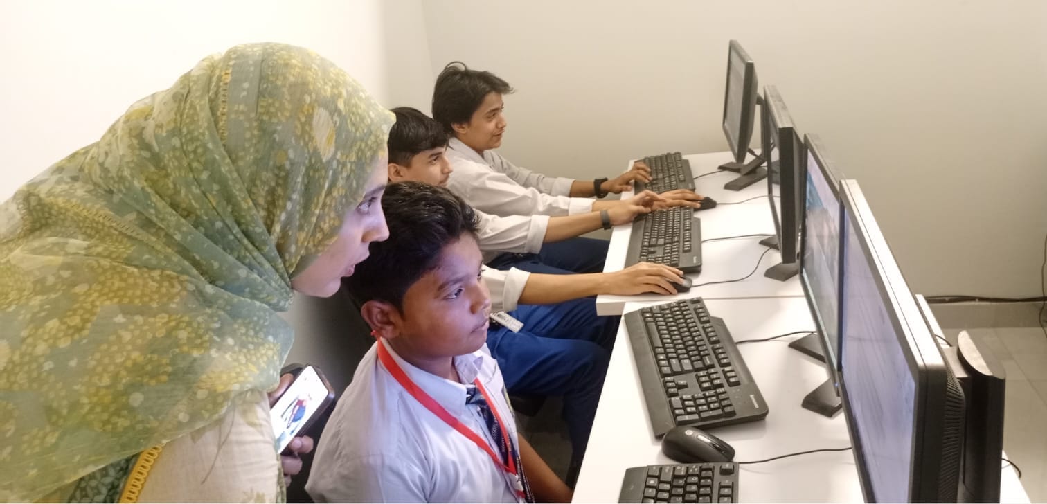Young male students visiting Alfa Tech campus