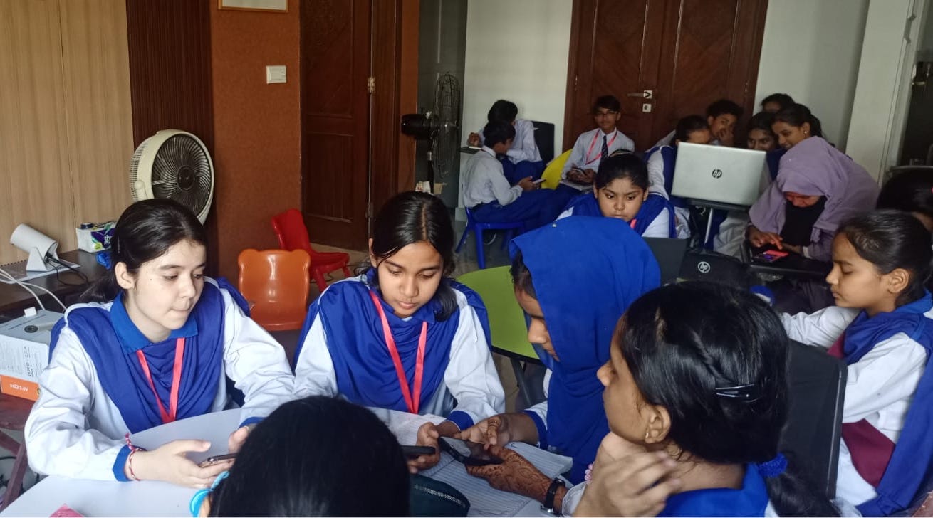 Junior students in a hands-on laptop session