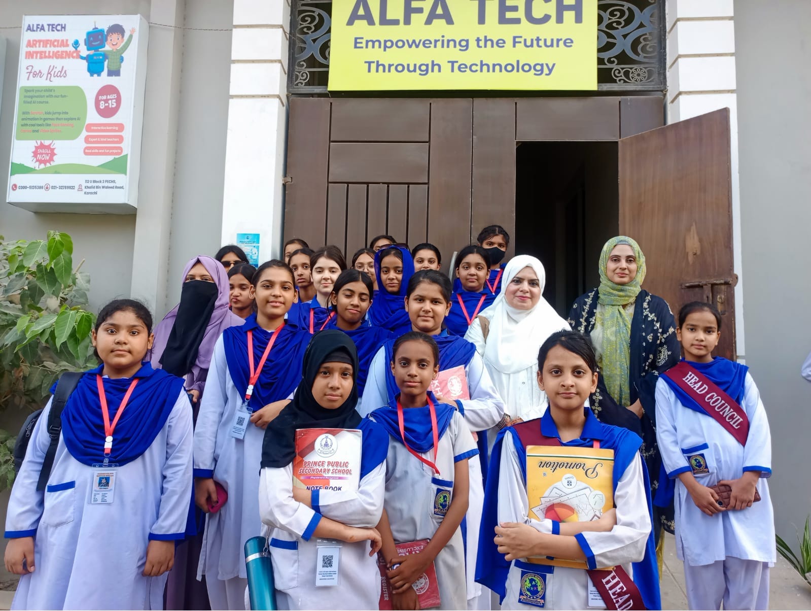 Junior female students at Dell computer workstations